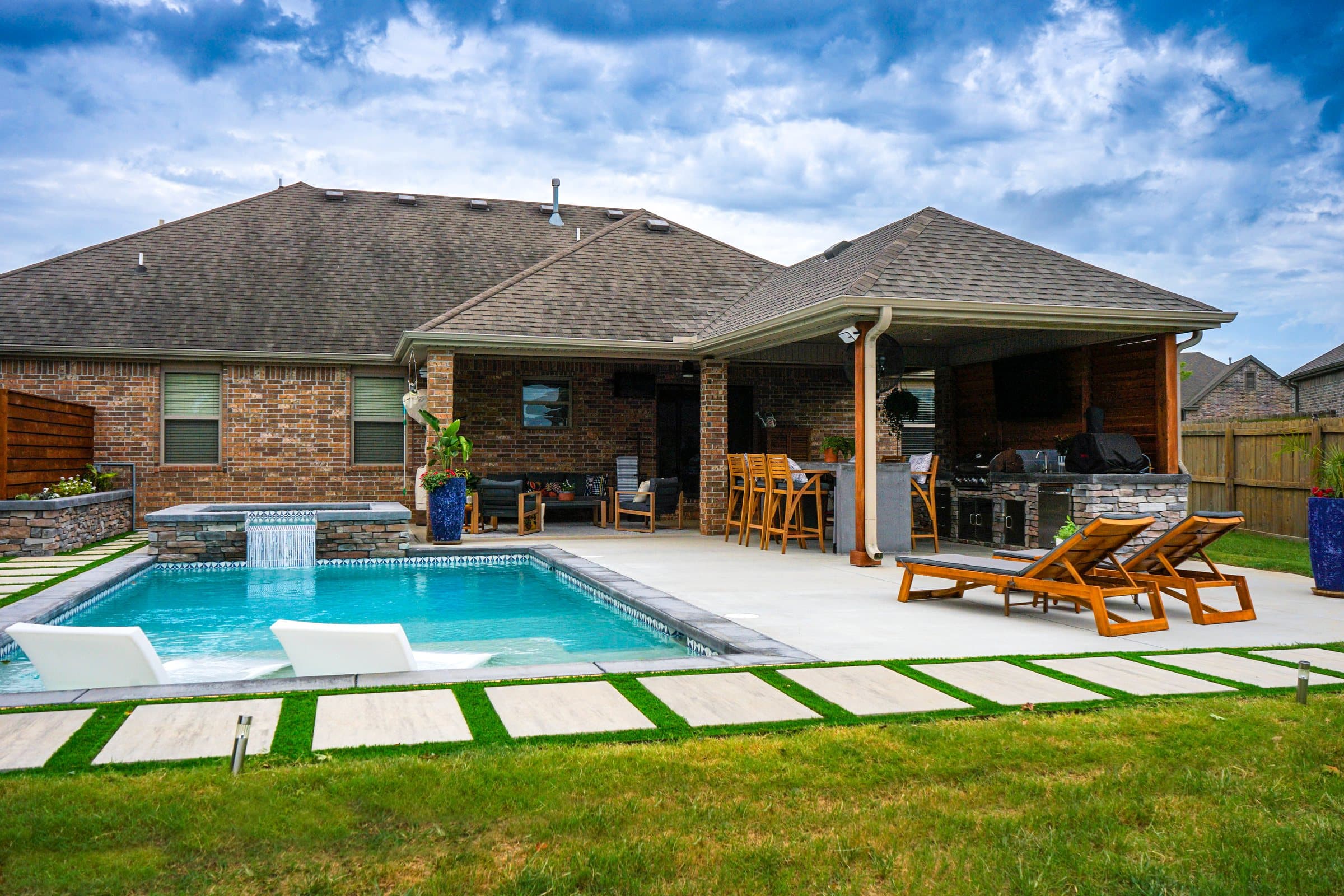The whole build: pool, spa, covered kitchen and walkways, Cave Springs