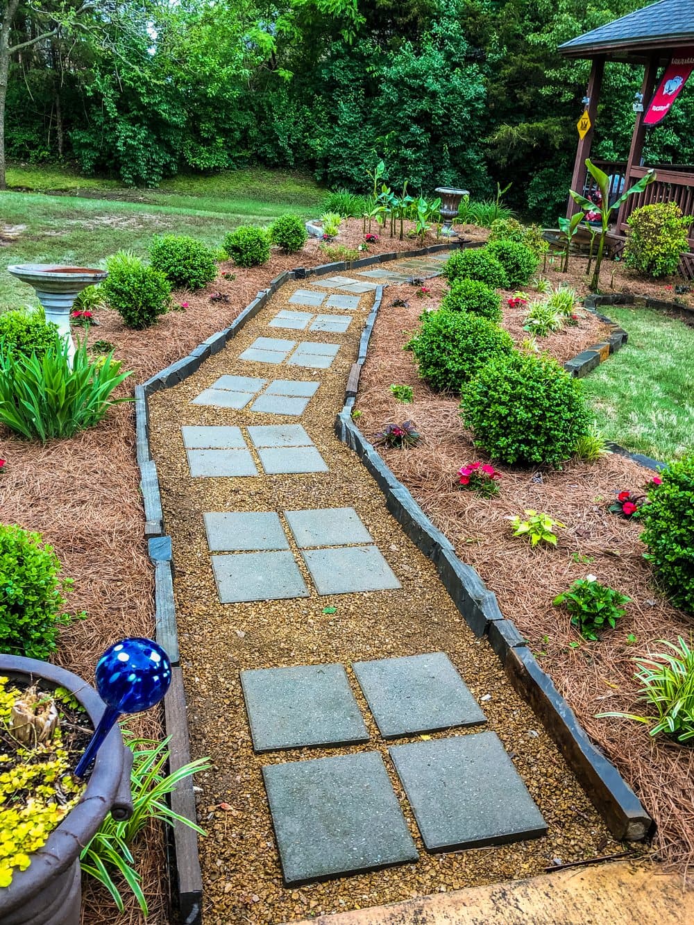 A stone path through the garden