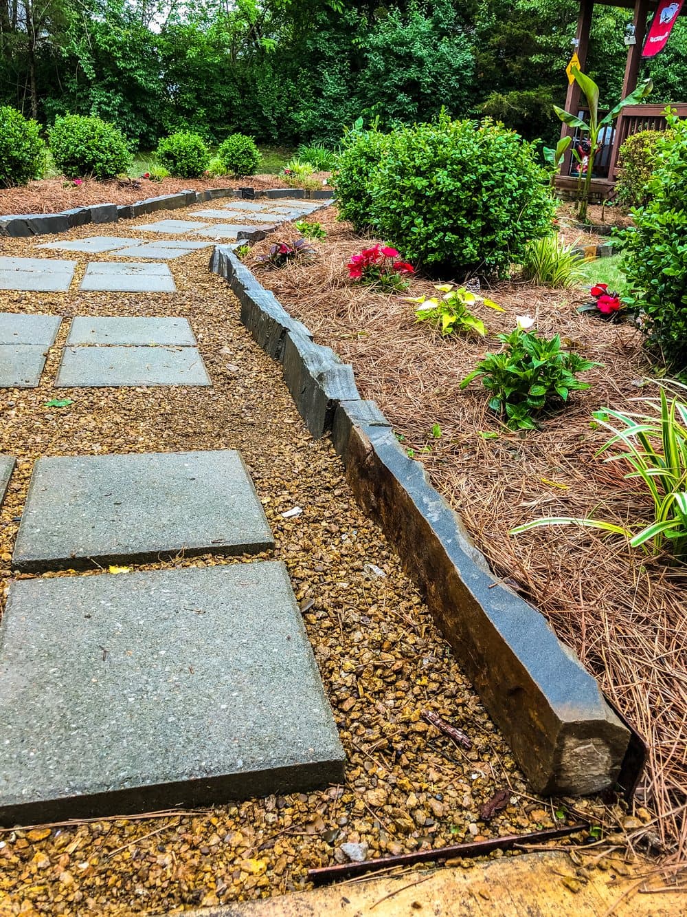 Stepping stones through planted beds